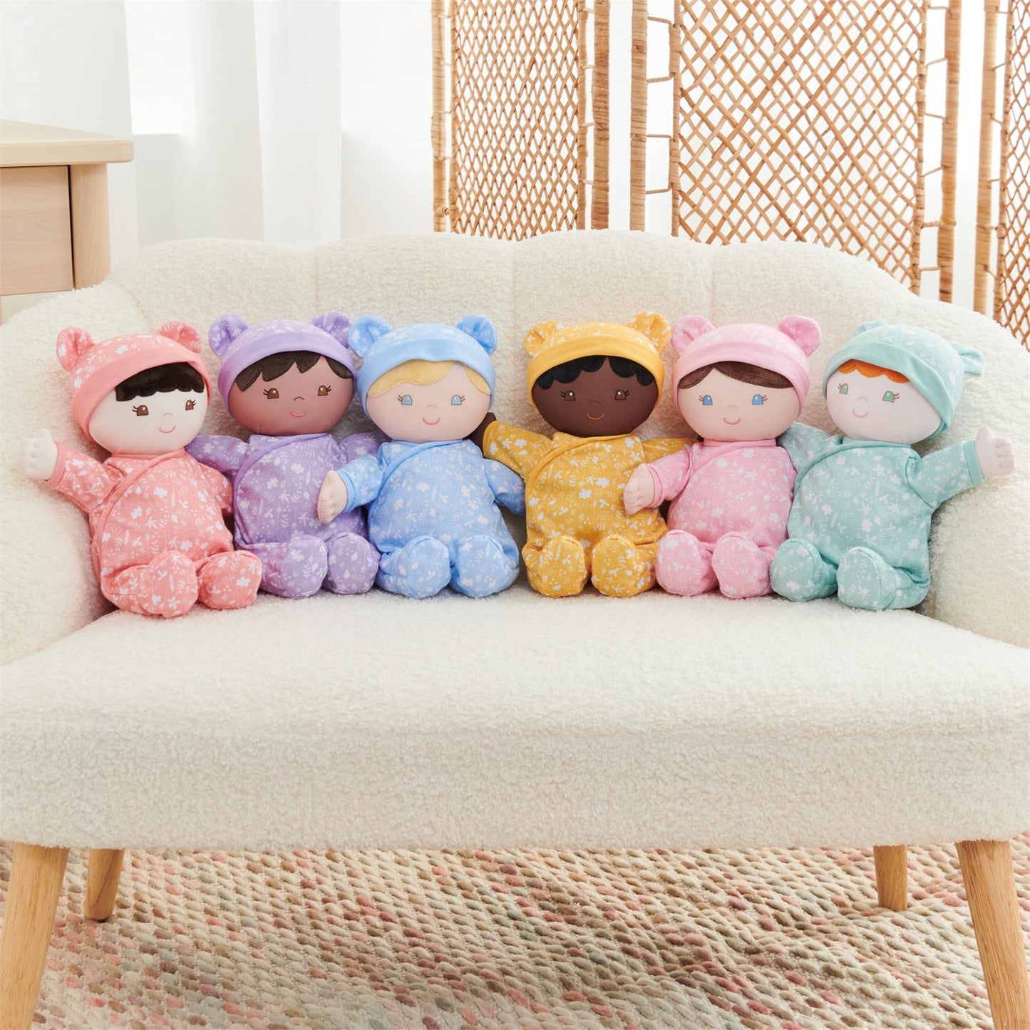 Plush Baby Doll Sustainable Leilani Dressed In A Lavender Onesie