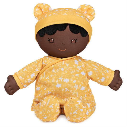 Plush Baby Doll Sustainable Camellia Dressed In A Yellow Onesie